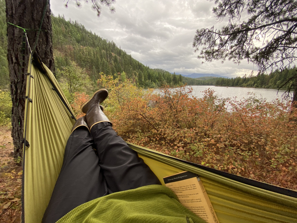 Taking a break in a hammock by the lake